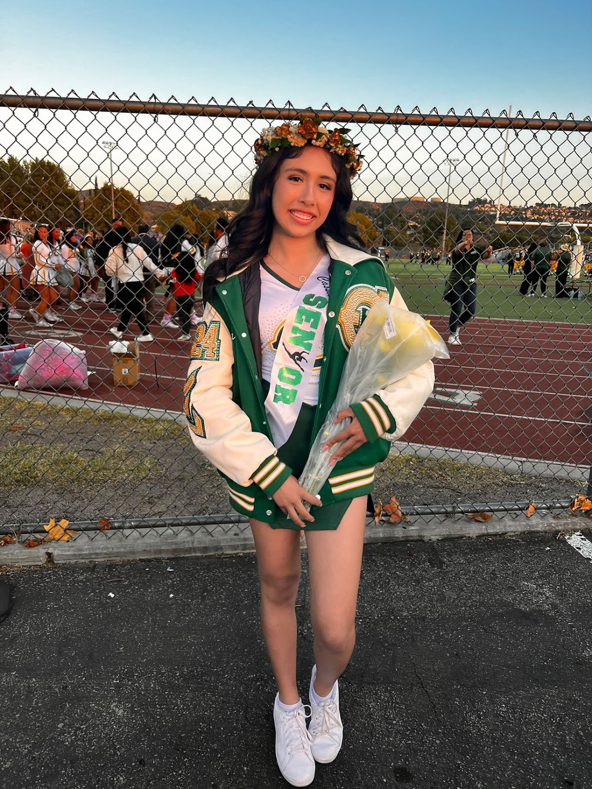 Happy customer in a blinged letterman jacket